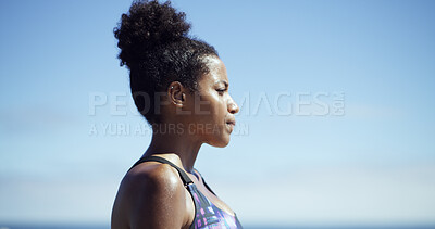 Buy stock photo Black woman, fitness and thinking at beach, sky or breathing with mockup space on break. African runner, girl and reflection with profile for workout, training or ocean for perspective in Nigeria