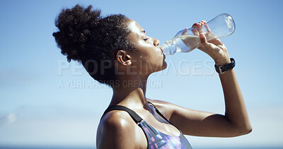 Buy stock photo Fitness, runner and woman on break, drinking water and hydration with liquid, outdoor and digestion. Thirsty, athlete and black person with fluid for temperature regulation, healthy and wellness