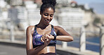 Fitness, check smart watch and woman in city for heart rate, training progress or results. Wristwatch, exercise and happy African person outdoor for health stats, timer and info for cardio wellness