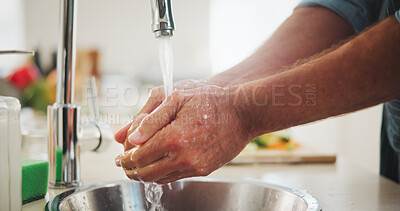 Buy stock photo Hygiene, cooking and man washing hands in kitchen for germ protection, wellness and safety. Faucet, person and cleaning dirt by tap water for disinfection, bacteria prevention and meal prep in home
