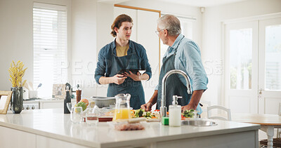 Buy stock photo People, tablet and meal prep with cooking, recipe tutorial or online guide in home. Man, mature parent and helping in kitchen with lunch ingredients, diet salad and internet steps for web blog
