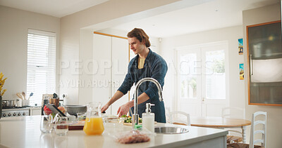 Buy stock photo Man, tablet and meal prep with internet, recipe tutorial or online guide in home. Learning, video instructions and person in kitchen with lunch ingredients, diet salad and cooking steps for web blog