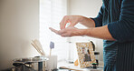 Person, hands and chef with ingredient in kitchen for seasoning, add or spice with pot in home. Culinary skill, cooking or preparing dish with food recipe for meal prep, house cuisine or hospitality
