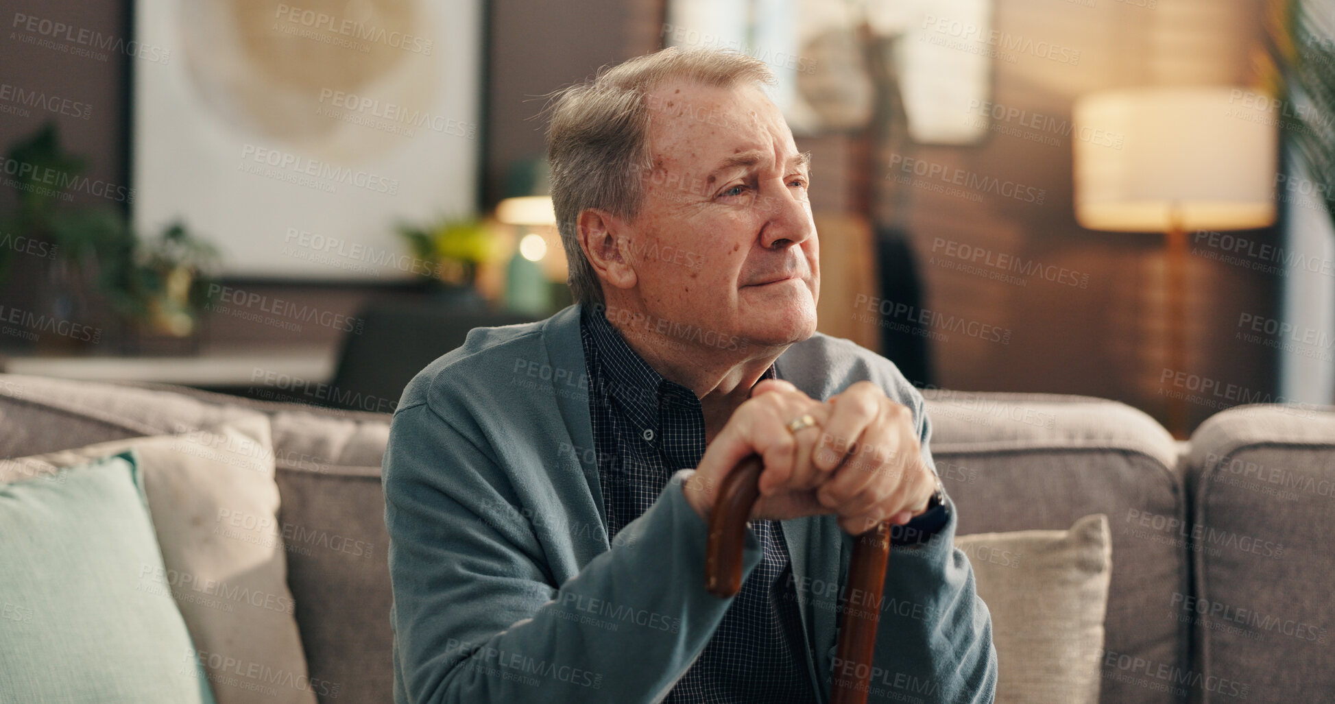Buy stock photo Retirement, think and old man with walking stick, dementia and memories of past in lounge and house. Depression, pensioner and elderly person with disability, alzheimer and unhappy with cane in home