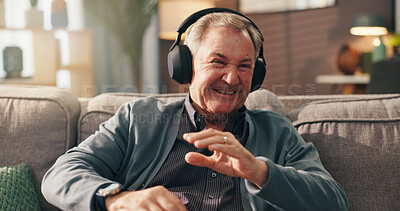 Buy stock photo Retirement, laugh and old man with headphones, relax and listen to podcast on break and living room. Happy, pensioner and elderly person with humor in house, radio and subscription for show on web