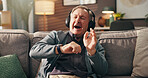 Home, laugh and old man with headphones, relax and listen to podcast on social media and retirement. House, happy and elderly person with humor in living room, radio and subscription for show on web