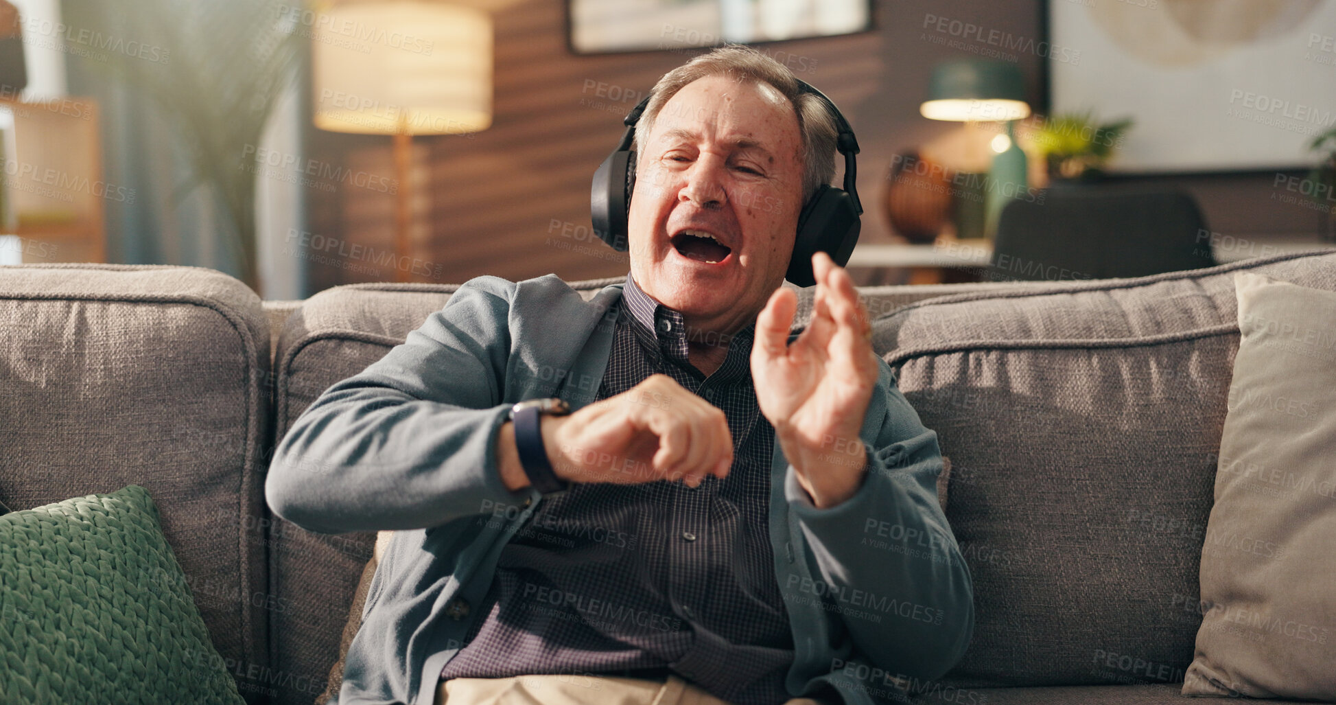 Buy stock photo Home, dance and old man with headphones, relax and listening to music in living room and retirement. Happy, pensioner and senior person with energy in house, radio or subscription for playlist on web