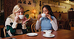 Women, friends and drink in coffee shop for break, reunion or bonding together. Girls, customer and beverage in cafe for catchup, communication and social gathering with latte for gossip discussion
