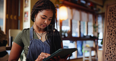 Buy stock photo Woman, waitress and typing with tablet at coffee shop for inventory, checklist or review at restaurant. Person, barista and click with tech, application and report for stock, menu or services at cafe