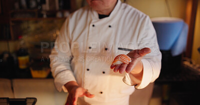 Buy stock photo Hands, man and sushi chef in kitchen, showing and skills with professional, cooking and diet. Nigiri, person and employee with Asian cuisine, seafood and hygiene with nutrition, salmon and catering