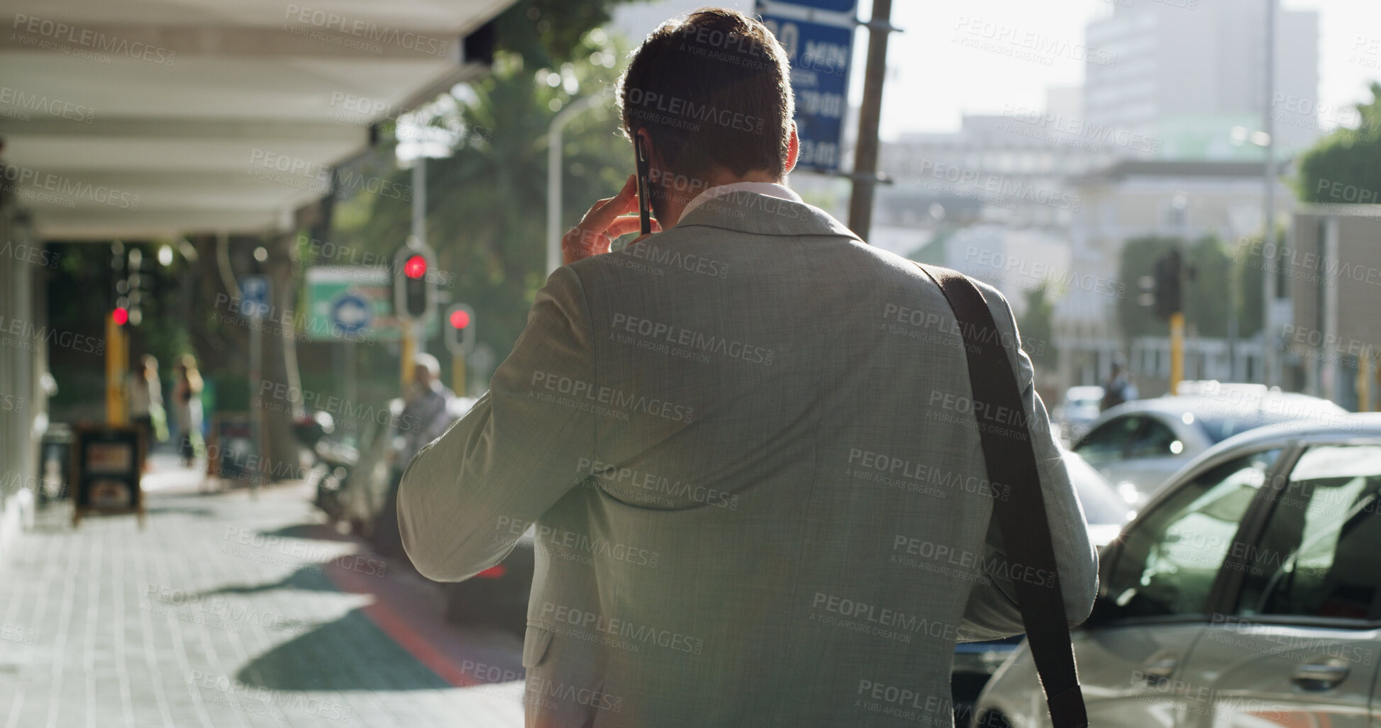 Buy stock photo Back, business and man with phone call in city for discussion, travel schedule and deal feedback. Male person, mobile and listen to conversation for morning commute, consulting client and negotiation
