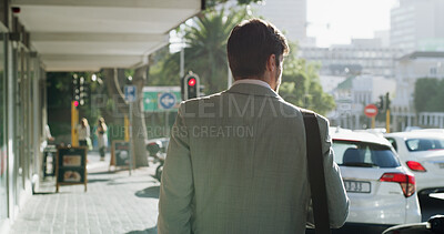 Buy stock photo Employee, man and commuting to work, city or lawyer on urban street in morning, outdoor and journey. Back, attorney and person with routine on road, commuter or walking to job, trip or court for case