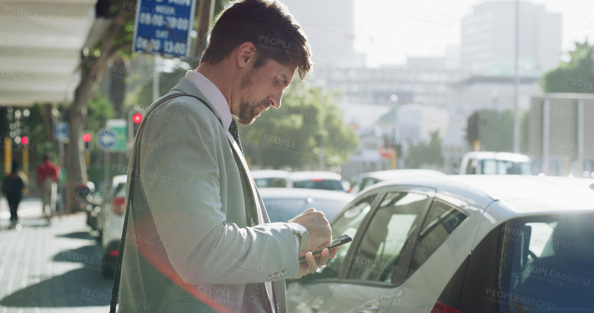 Buy stock photo Businessman, phone and scroll in city, travel or booking taxi on web for urban commute to workplace. Person, smartphone and click with mobile app in town for ride, transport or check trip schedule