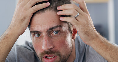 Buy stock photo Portrait, man and checking hairline, worry or concerned for hair loss in house, self care and scalp. Home, grooming and inspection for thinning texture, haircare and person with anxiety for baldness