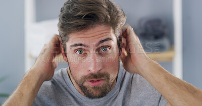 Buy stock photo Portrait, man and checking hairline, concerned or worry for hair loss in house, self care and scalp. Home, grooming and inspection for thinning texture, haircare and person with anxiety for baldness
