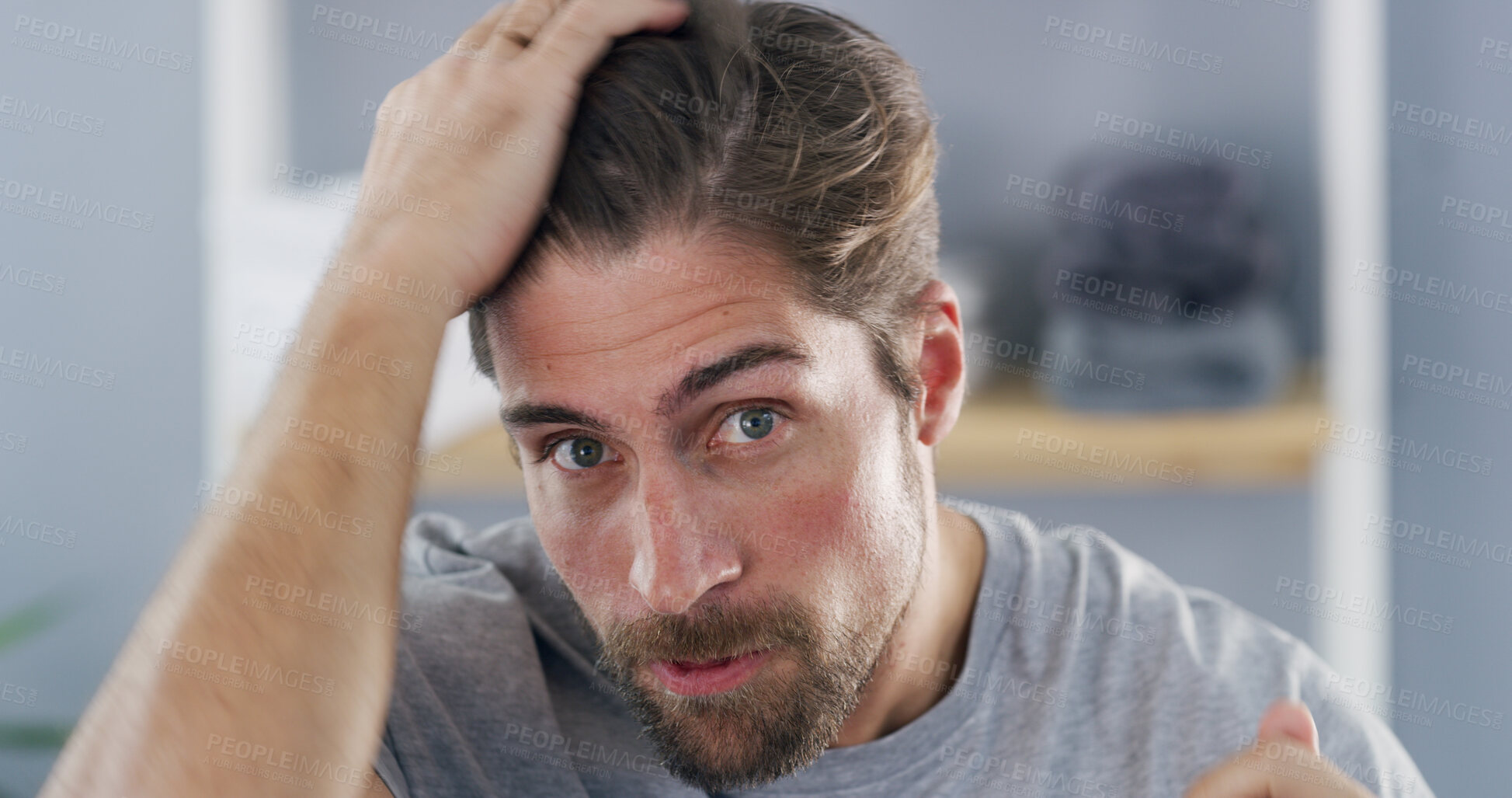 Buy stock photo Portrait, man and checking hairline, self care or concerned for hair loss in house, worry and scalp. Home, grooming and inspection for thinning texture, haircare and person with anxiety for baldness