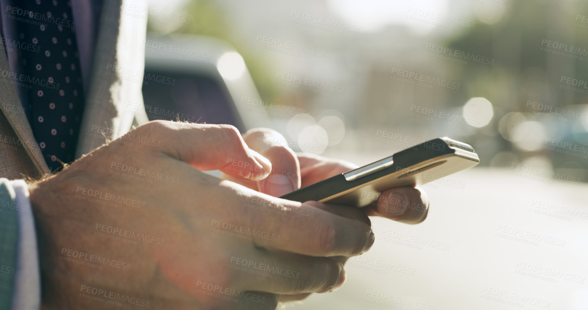 Buy stock photo Business person, hands and chat with phone in city for scroll, online research and text message on street. Travel, professional and smartphone in urban town for checking schedule on morning commute