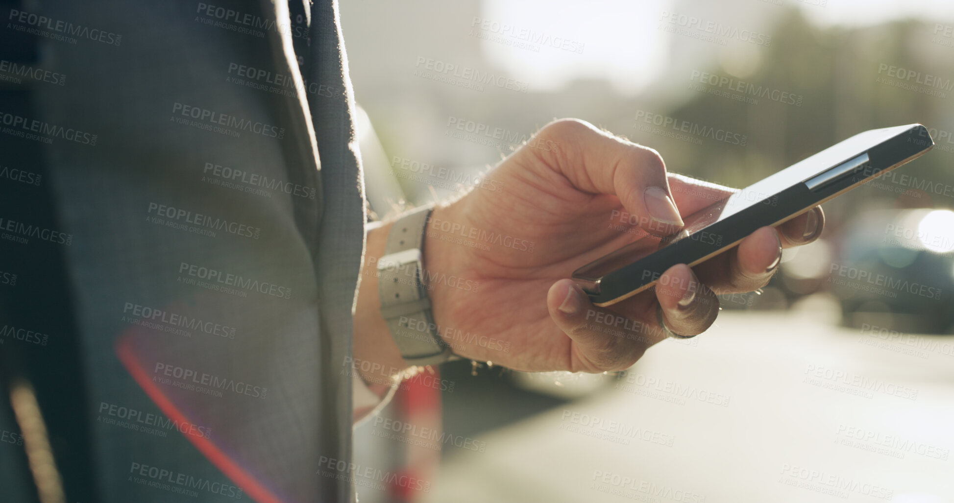 Buy stock photo Business, hands and man with phone in city for ride booking, check schedule or morning commute. Professional, person or smartphone outdoor for reading notifications, text message or internet browsing