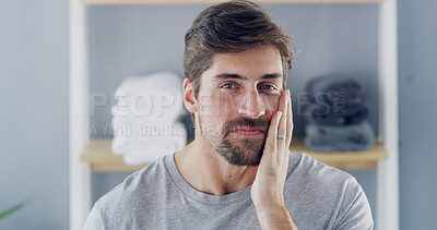 Buy stock photo Portrait, beard and skincare with man in bathroom for beauty, morning routine and pride. Self care, dermatology and facial grooming with male person in home for confidence, hygiene and aesthetic