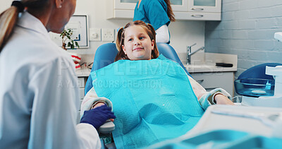 Buy stock photo Girl, dentist and chair with patient for checkup, consultation or appointment at clinic. Child, kid or listening with medical orthodontist for teeth surgery, oral and gum healthcare at hospital