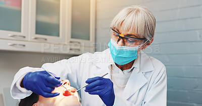 Buy stock photo Doctor, patient and procedure with tools at dentist for mouth inspection, gum assessment and exam. Dental care, safety and women with instrument for oral cavity, tooth decay and health treatment