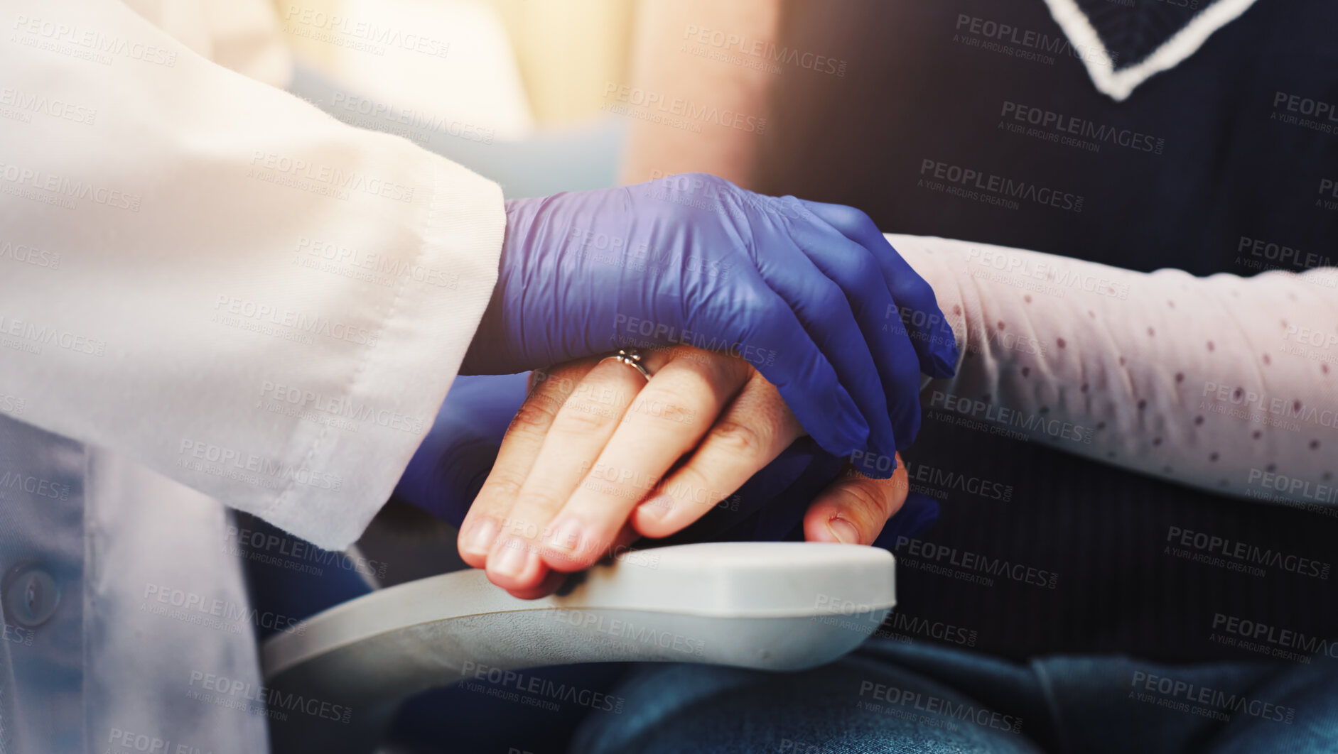 Buy stock photo Doctor, patient and holding hands with support at dentist for oral health, checkup and procedure. Healthcare, people and trust at hospital for dental care, medical service or consultation with gloves