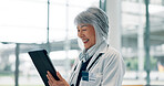 Healthcare, doctor and Asian woman in hospital, tablet and email for medical report. Happy person, employee and professional in clinic, tech and app for schedule, research mission or positive results