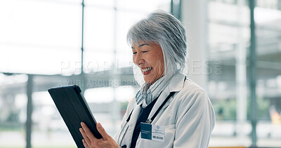 Buy stock photo Healthcare, doctor and Asian woman in hospital, tablet and email for medical report. Mature person, happy or professional in clinic, tech and app for schedule, research mission or positive results