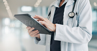 Buy stock photo Person, doctor and hands with tablet at hospital for research, medical discovery or information. Healthcare worker, cardiologist or browsing with technology for telehealth or online app at clinic