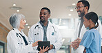 Doctors, tablet and group in hospital, healthcare and conversation with teamwork. Employees, medical service and professional in clinic, tech and feedback for diagnosis, talking and app for schedule