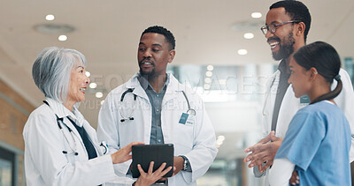 Buy stock photo Doctors, tablet and group in hospital, healthcare and conversation with teamwork. Employees, medical service and professional in clinic, tech and feedback for diagnosis, talking and app for schedule