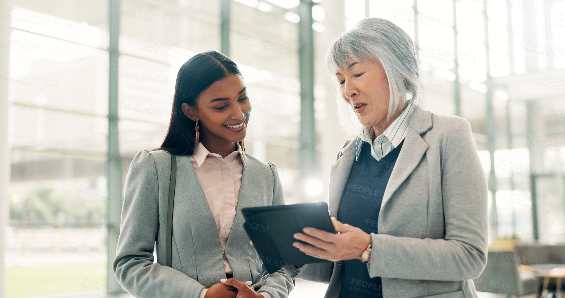 Buy stock photo Business, tablet or women in office, discussion or online investment with collaboration. Employees, people or financial advisors in hallway, tech or digital app for inflation report or review revenue