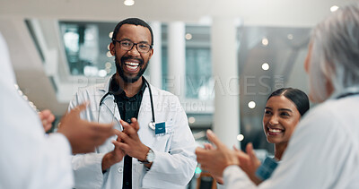 Buy stock photo Healthcare, doctor and group with smile, applause and celebration for achievement, win and hospital. Happy, medical professional and people with success in clinic, victory and clapping for good news