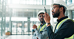 Engineer, radio and team discussion for construction project, maintenance or progress update. African men, architect and talking with tech for building inspection, office renovation and communication