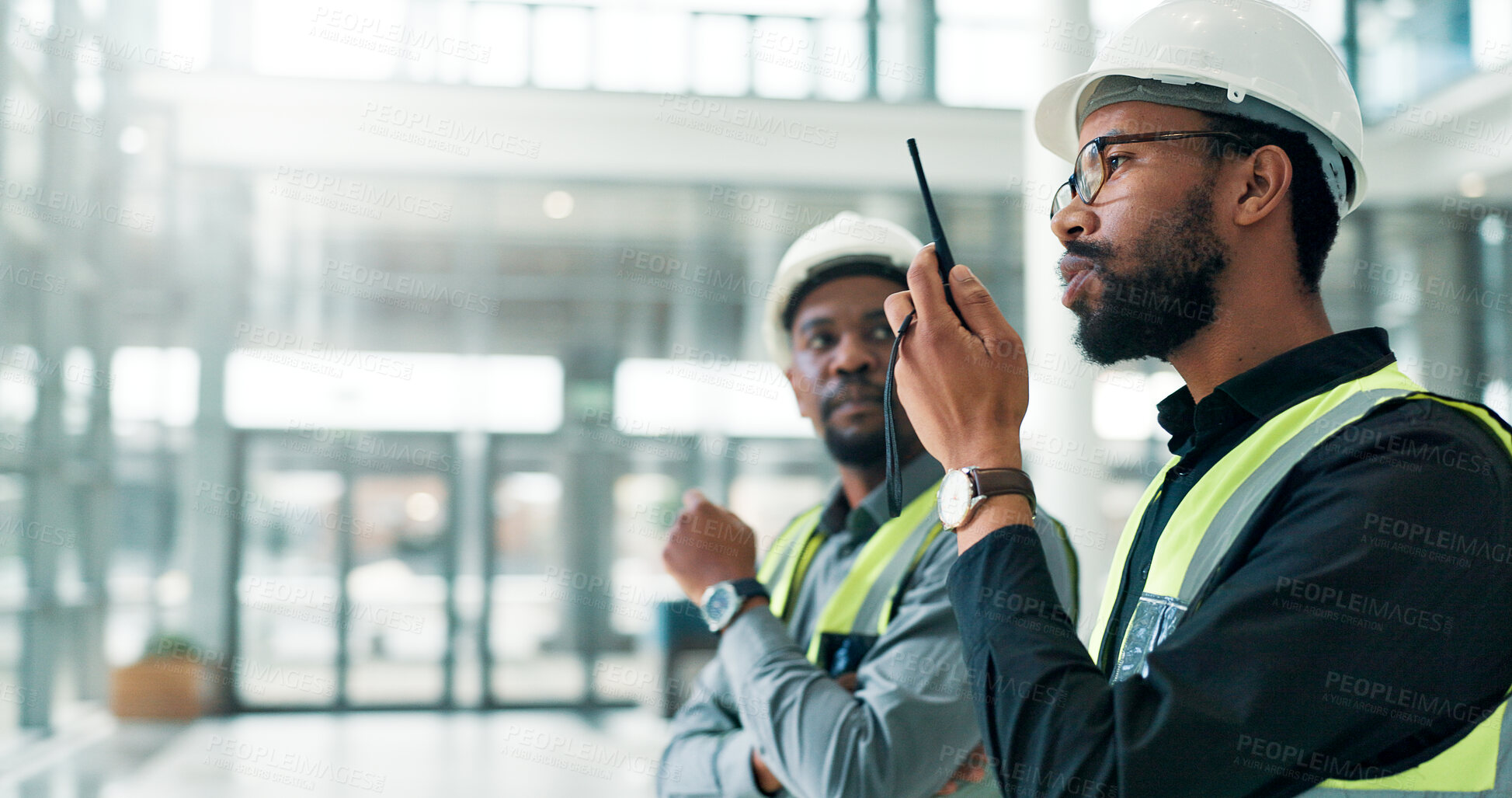 Buy stock photo Engineer, radio and team discussion for construction project, maintenance or progress update. African men, architect and talking with tech for building inspection, office renovation and communication