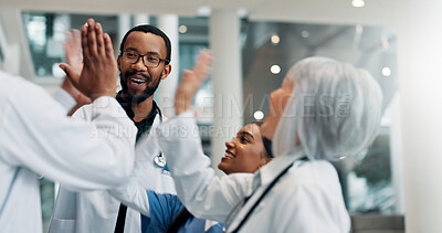 Buy stock photo High five, doctor and group in hospital, success and happy for achievement, healthcare and wellness. Accomplishment, medical professional and people with smile in clinic, support and gesture for win