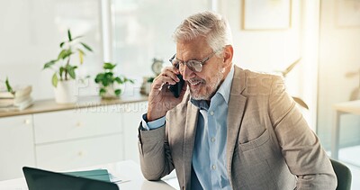 Buy stock photo Finance, laptop and phone call with business man in office for feedback, research or tax review. Communication, computer and smile with mature accountant at desk in workplace for administration