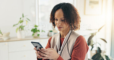 Buy stock photo Woman, phone and texting in office with news, message or notification or search in startup. Online, chat or entrepreneur reading email on mobile app, social media or networking at creative business