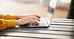 Hands, woman and typing on laptop outdoor for research, reading email and proofreading article. Journalist, remote work and pc for story planning, post schedule and information with news publication