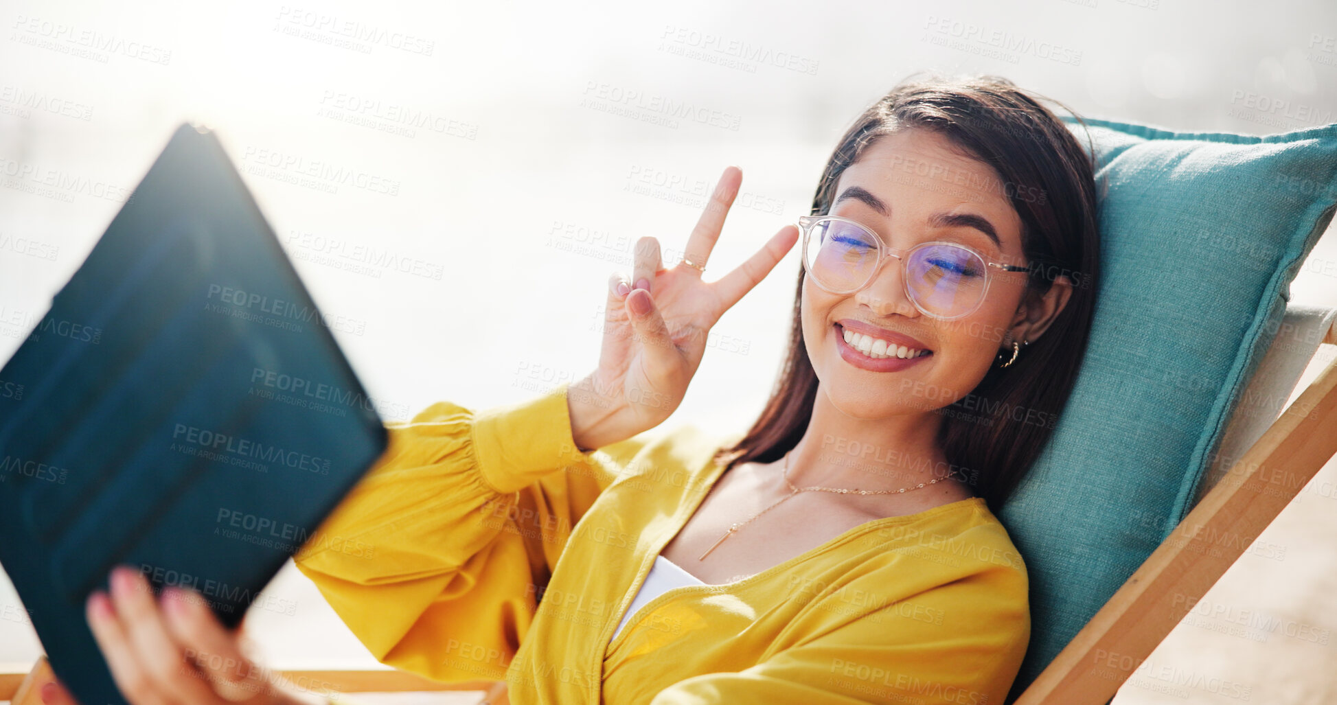 Buy stock photo Peace sign, selfie and tablet with woman outdoor on chair for social media post or update in summer. Emoji, photography and profile picture with happy influencer online for memories or wellness