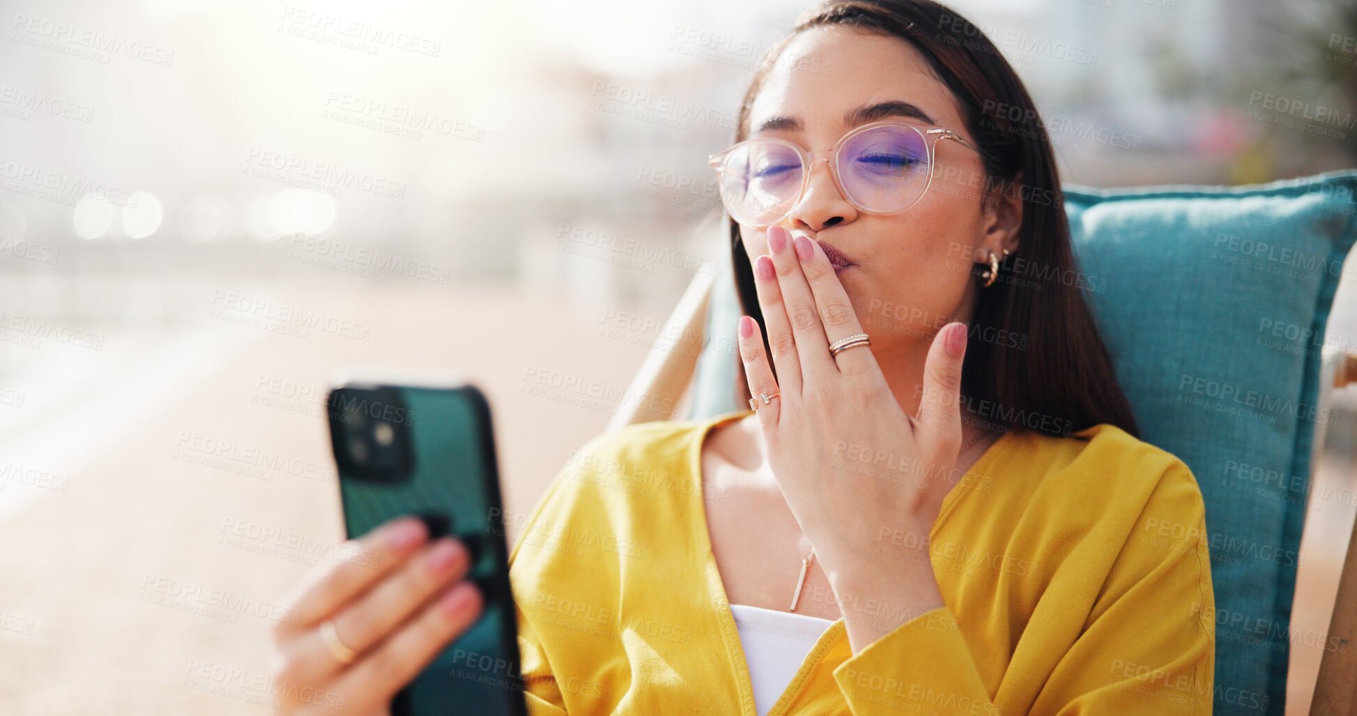 Buy stock photo Woman, video call and kiss with influencer for vacation, holiday or outdoor getaway experience in city. Female person, vlogger and social media with smile for travel, stream review or relax at resort