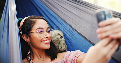 Buy stock photo Happy, tourist and woman on hammock, selfie and photography for summer vacation, outdoor and travel. Relax, traveller and person with smile for profile picture, post and memory for holiday or trip
