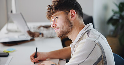 Buy stock photo Creative, design and writing with business man in coworking office for planning or problem solving. Notes, solution and thinking with designer person in workplace for learning or research on computer