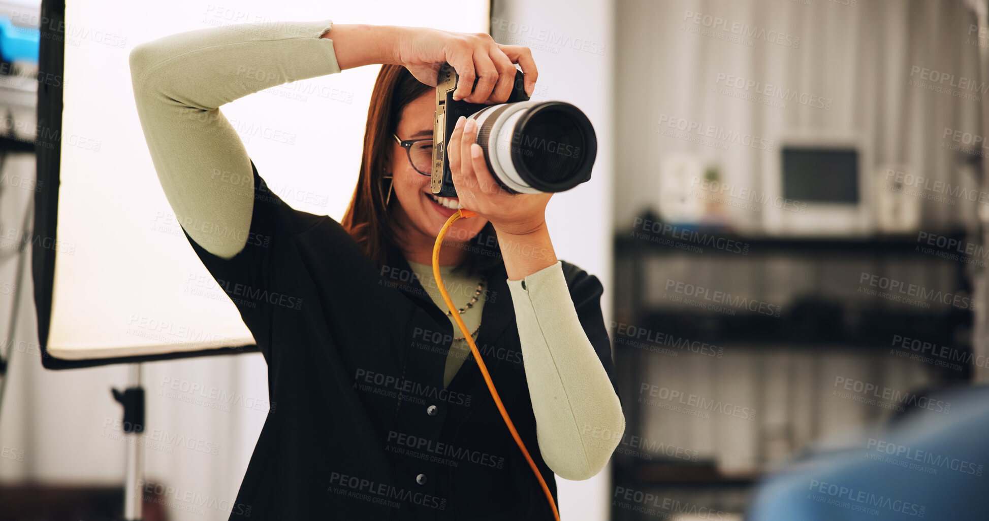 Buy stock photo Woman, photographer and camera in studio for photoshoot, production and magazine casting. Female person, equipment and backstage with model for filming content, capture image and photography industry