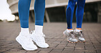 Fitness, legs and warm up with personal trainer, outdoor or practice for marathon, feet and routine. People, training and getting ready to run, footwear and workout with instructor, wellness or sport