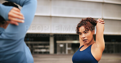 Buy stock photo Fitness, arm warm up and women in city with workout or training for wellness, health or activity. Sports, stretching and female athletes with exercise together in urban town for weightloss in morning