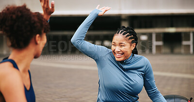 Buy stock photo Fitness, workout and friends with high five in city for exercise success, teamwork or achievement. Athlete, women and happy with celebration outdoor for wellness goals, training progress and support