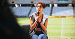 Athlete, mic and woman in interview at stadium for sports broadcast, media question or game update. Public relations, news and person speaking at press conference for fitness event and fan engagement