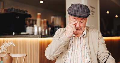 Buy stock photo Senior man, sad and morning in cafe for break, lonely and unhappy with nostalgia in retirement. Elderly, customer and crying in bistro with thinking, remember and reflection of memory with grief