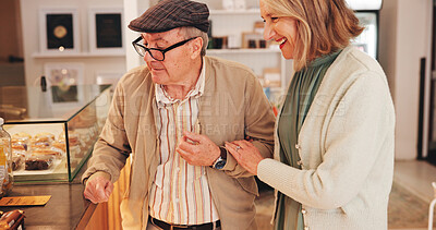 Buy stock photo Elderly couple, cafe and choice for cake by display with smile, date and excited at coffee shop. Senior people, man and woman with decision, dessert and happy with love for pastry sale at bakery